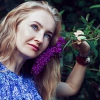 Eva M Grant